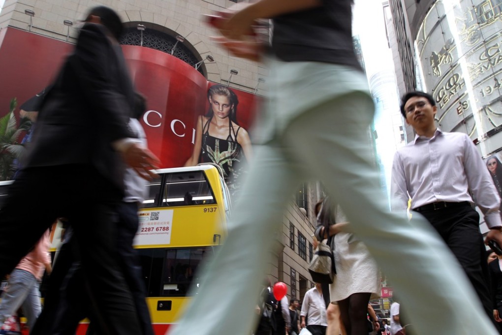 By-census data shows 11.1 per cent of some 3.43 million employees worked 60 hours or more a week in Hong Kong. Photo: Edward Wong