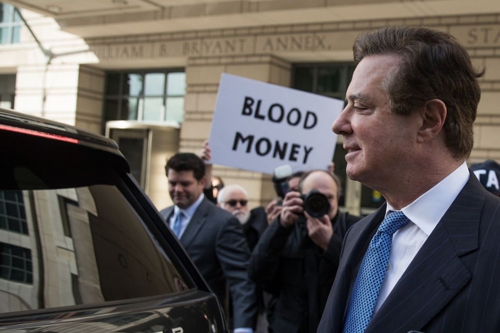 Paul Manafort, former campaign manager for Donald Trump, exits the E Barrett Prettyman Federal Courthouse on Wednesday in Washington. This is Manafort’s first court appearance since his long-time deputy Rick Gates pleaded guilty last week in special counsel Robert Mueller’s Russia probe. Photo: Getty Images via AFP