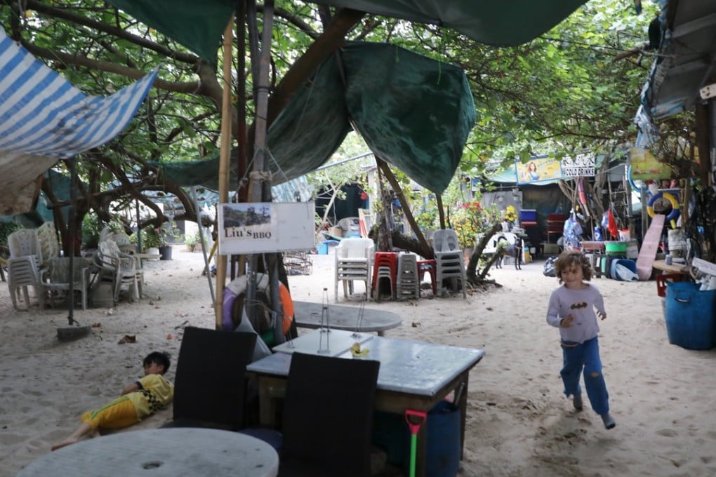Empty stalls under a shelter are seen on Shek O Beach. Photo: Sam Tsang