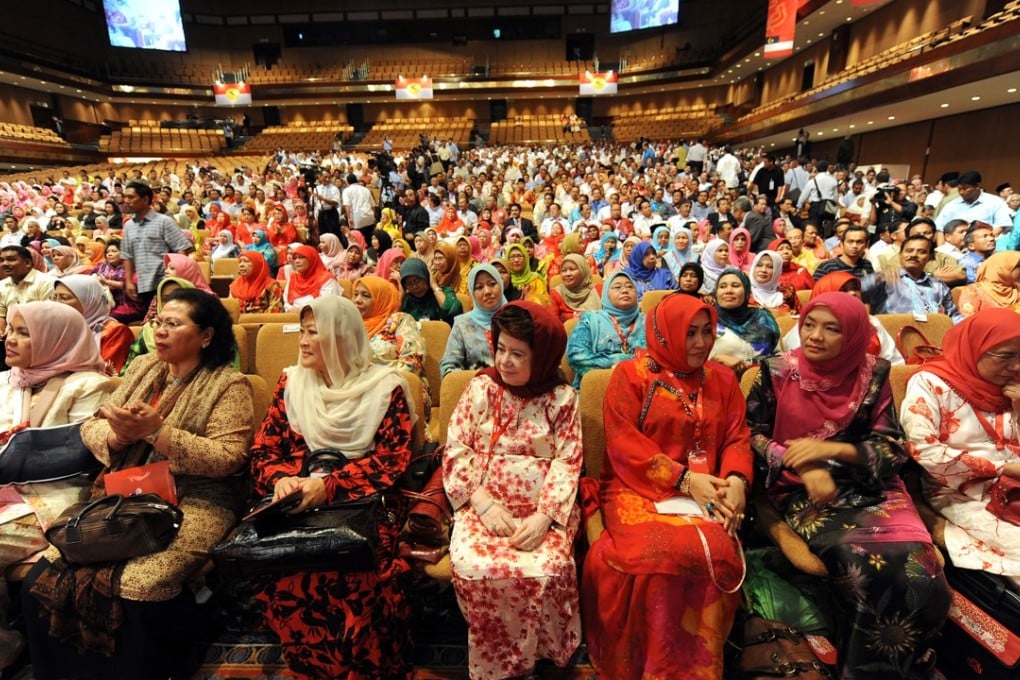 Delegates attend a gathering of Malaysia's ruling United Malays National Organisation. Malaysia has a poor track record when it comes to gender equality. Photo: AFP
