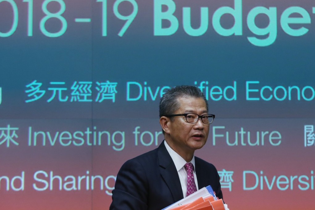 Financial Secretary Paul Chan arrives for a press conference at Tamar on February 28, after delivering the 2018-2019 budget for Hong Kong. Photo: Sam Tsang
