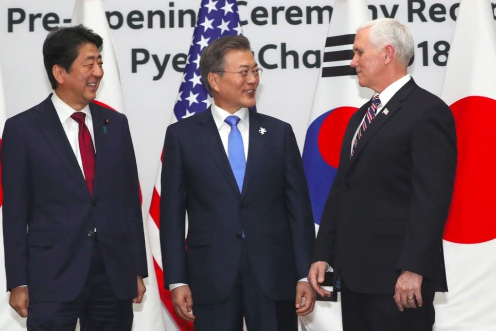 South Korean President Moon Jae-in, centre, with US Vice-President Mike Pence, right, and Japanese Prime Minister Shinzo Abe. Photo: AFP