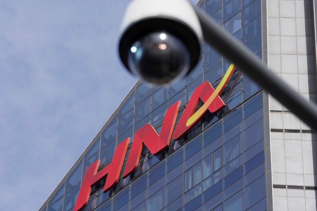 A HNA Group logo is seen on the building of HNA Plaza in Beijing, China February 9, 2018. REUTERS/Jason Lee