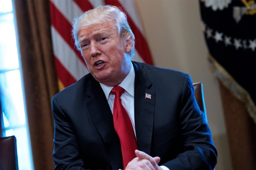 US President Donald Trump speaks on steel and aluminum tariffs during a meeting with industry leaders in the Cabinet Room of the White House on Friday in Washington. Photo: AFP