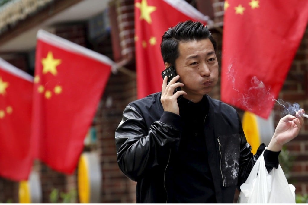 Raising cigarette taxes to keep the price at a minimum of US$3.15 per packet can keep Chinese kids from smoking, according to a new survey. Photo: Reuters