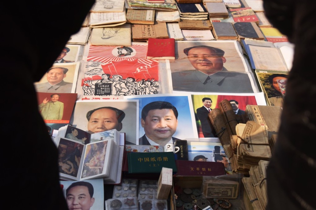 Posters of Chinese President Xi Jinping and Mao Zedong in Beijing. Photo: AFP