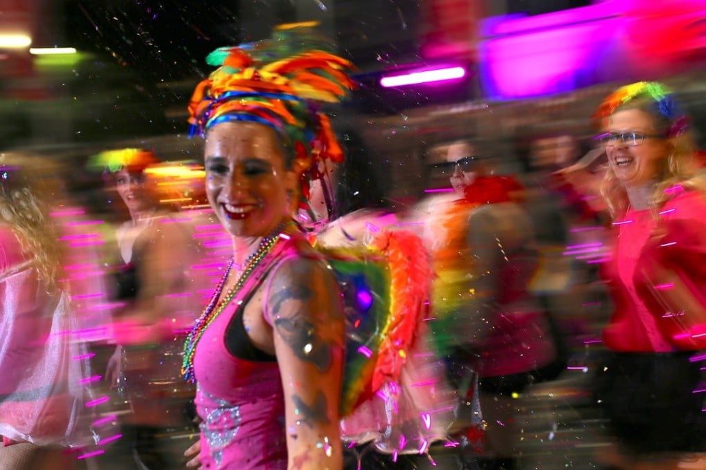 Participants dance during the 40th anniversary of the Sydney Gay and Lesbian Mardi Gras Parade in central Sydney on March 3. Photo: Reuters