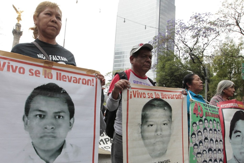 Relatives of the 43 missing students marched in the municipality of Iguala, in the southern state of Guerrero, demanding justice 41 months after their disappearance in Mexico City. Photo: EPA