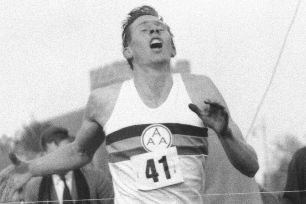 Roger Bannister hits the tape to break the four-minute mile. Photo: AP