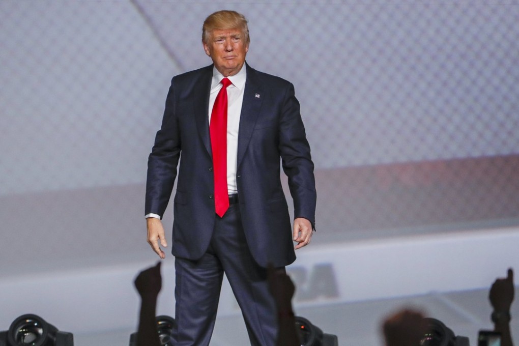 Donald Trump: Ready to draw his trade pistol. Photo: EPA