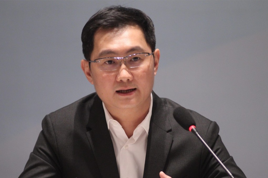 Tencent CEO Pony Ma Huateng addressing a briefing during the annual parliamentary sessions in Beijing.