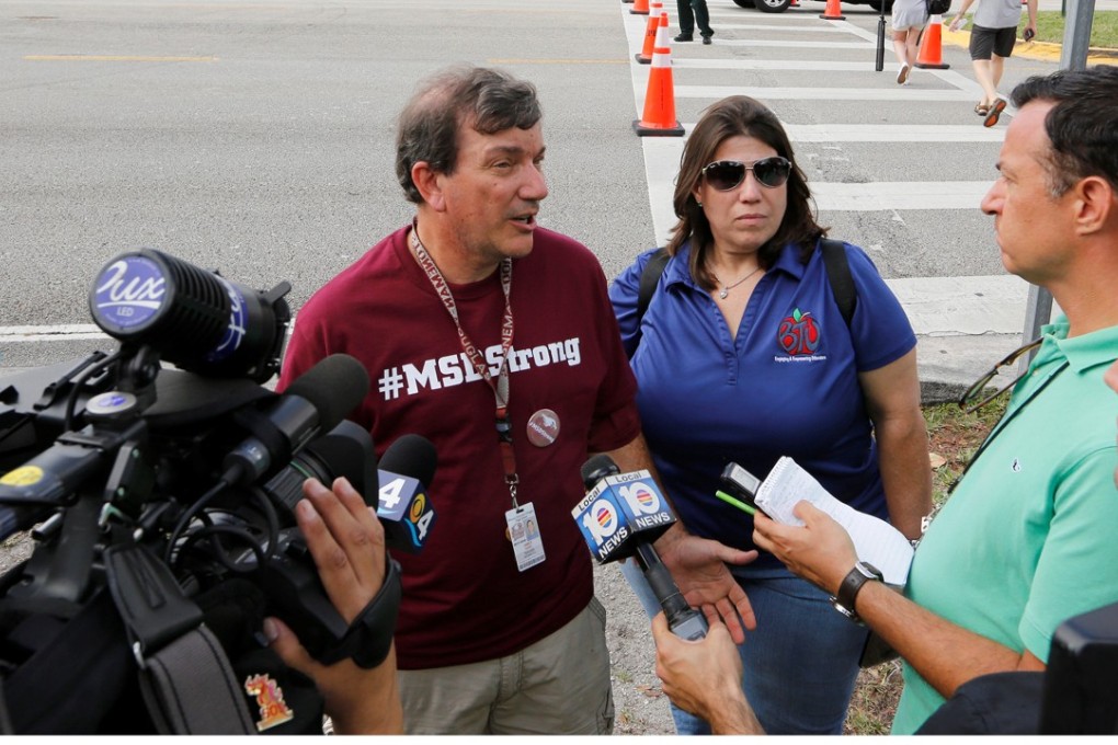 Mathematics teacher Jim Gard speaks with reporters at Marjory Stoneman Douglas High School in Parkland, Florida, on February 23. Photo: Reuters