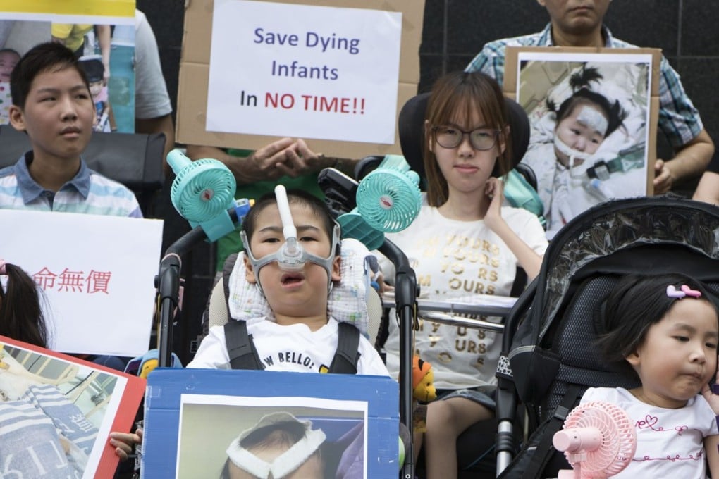 Children suffering from spinal muscular atrophy rally outside the government headquarters in Admiralty for more support in October 2017. Photo: Kwok Wing-kin