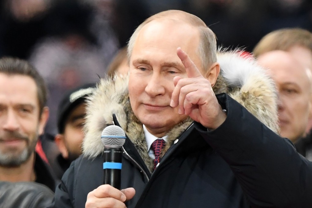 President Vladimir Putin at a rally before the presidential election on March 18, 2018. Photo: AFP