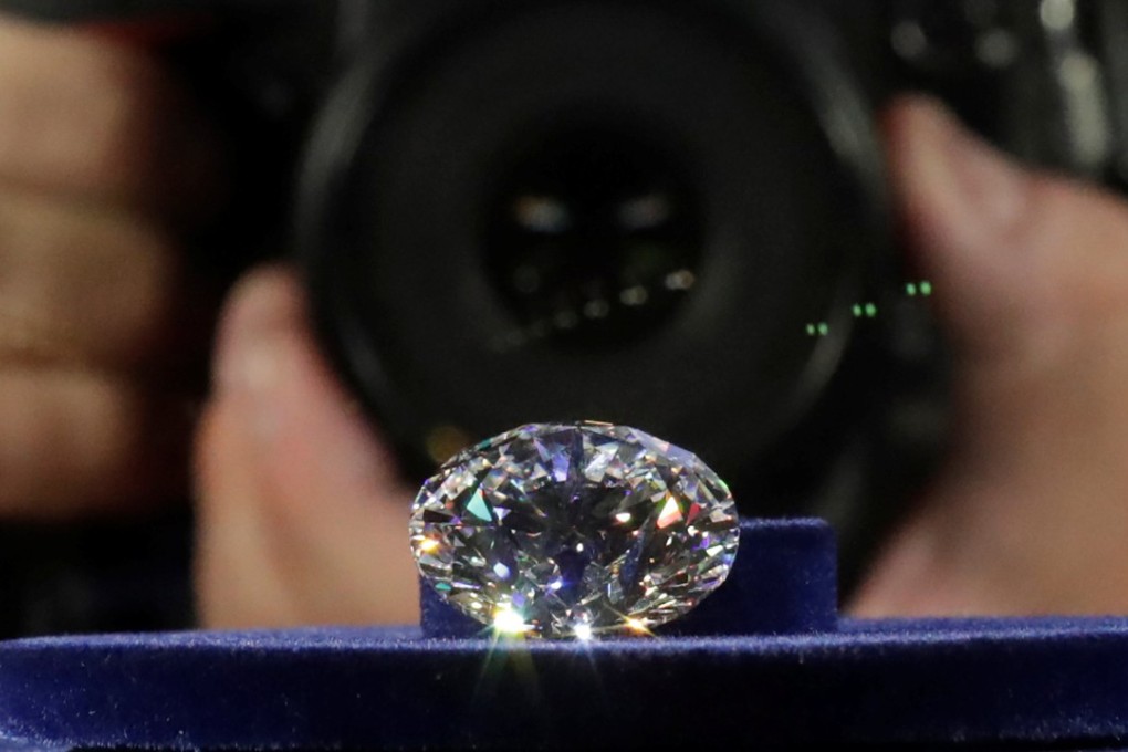 A 51.38-carat diamond on display during Russian miner Alrosa's presentation of the Dynasty polished diamonds collection in Moscow on August 1, 2017. Photo: REUTERS/Tatyana Makeyeva