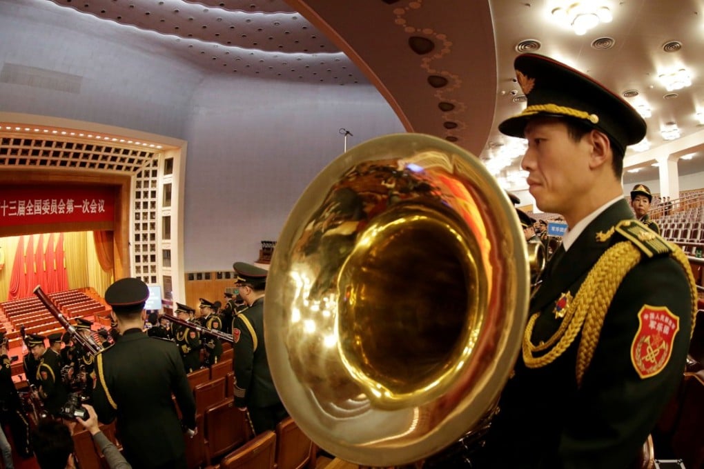 Military band members rehearse for the opening session of the Chinese People's Political Consultative Conference (CPPCC) at the Great Hall of the People in Beijing, China March 3, 2018. Photo: REUTERS/Jason Lee