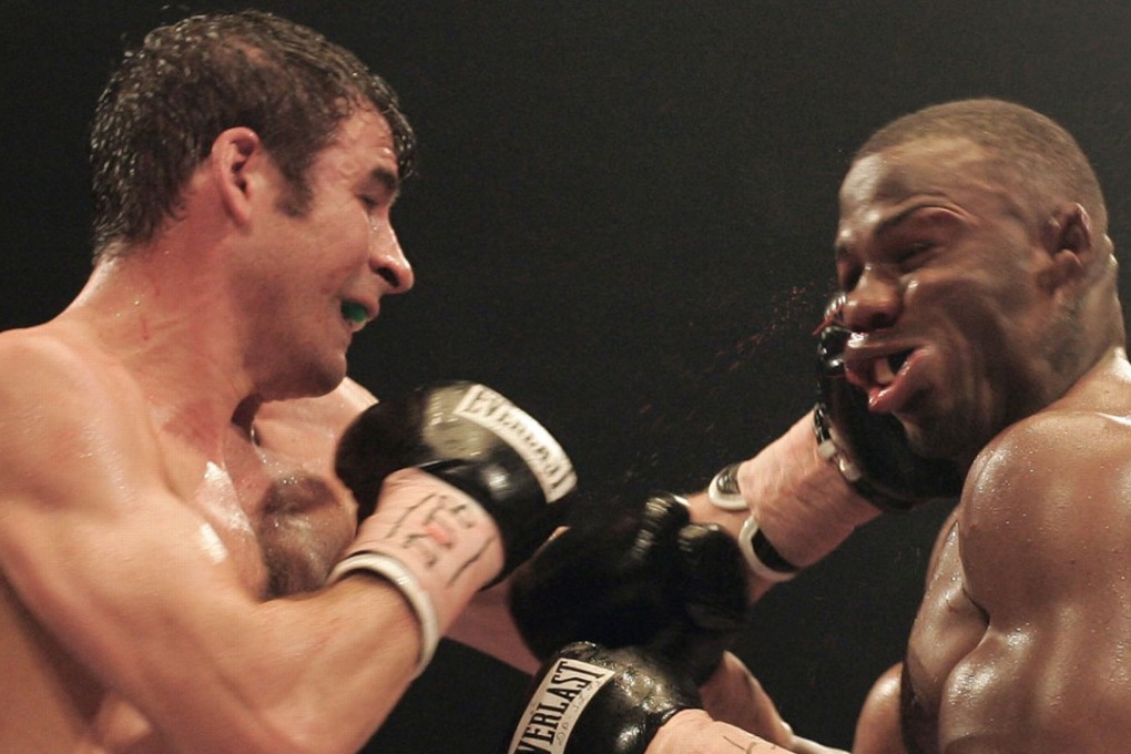 Joe Calzaghe (left) scored a convincing win over American Jeff Lacy. Both fighters careers would go on very different trajectories following the bout. Photo: AP