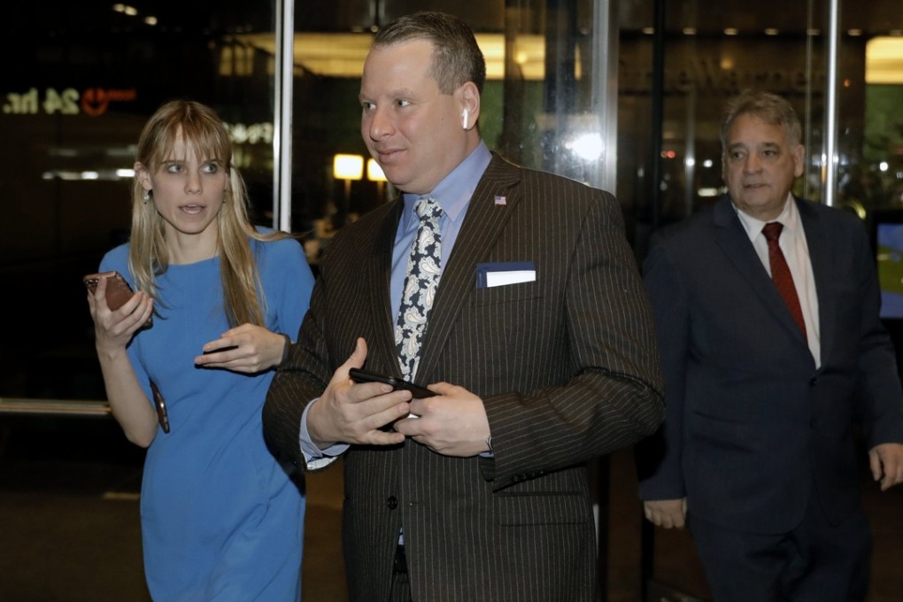 Former Trump campaign aide Sam Nunberg (centre) exits CNN News headquarters after being interviewed in New Yorkon Monday. Photo: EPA