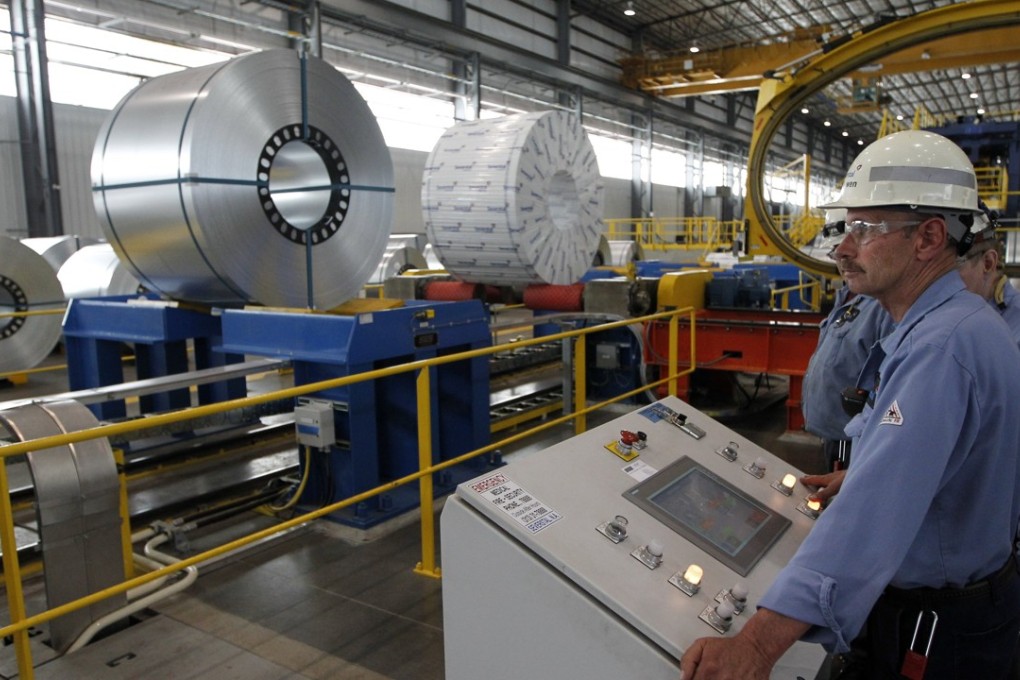 Al Bowen watches rolled steel on the line after it was treated on the hot-dip galvanising line at the Severstal North America plant in Dearborn, Michigan. Canada and the European Union plan to retaliate should the US go ahead with tariffs on steel and aluminium imports from around the world, as announced by Trump on March 1, 2018. Photo: EPA-EFE