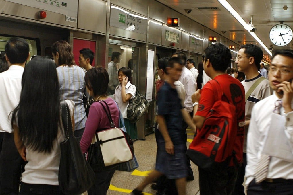 Singaporeans are materially well off and secure, but their serious demeanour doesn’t convey happiness, sociologist Daniel Goh observes. Photo: AFP