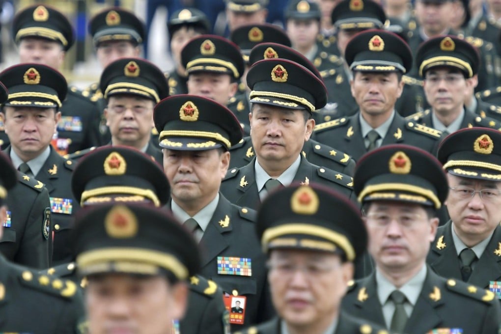 Members of the People's Liberation Army make their way to the Great Hall of the People in Beijing on Monday for the start of the National People’s Congress. Photo: Kyodo