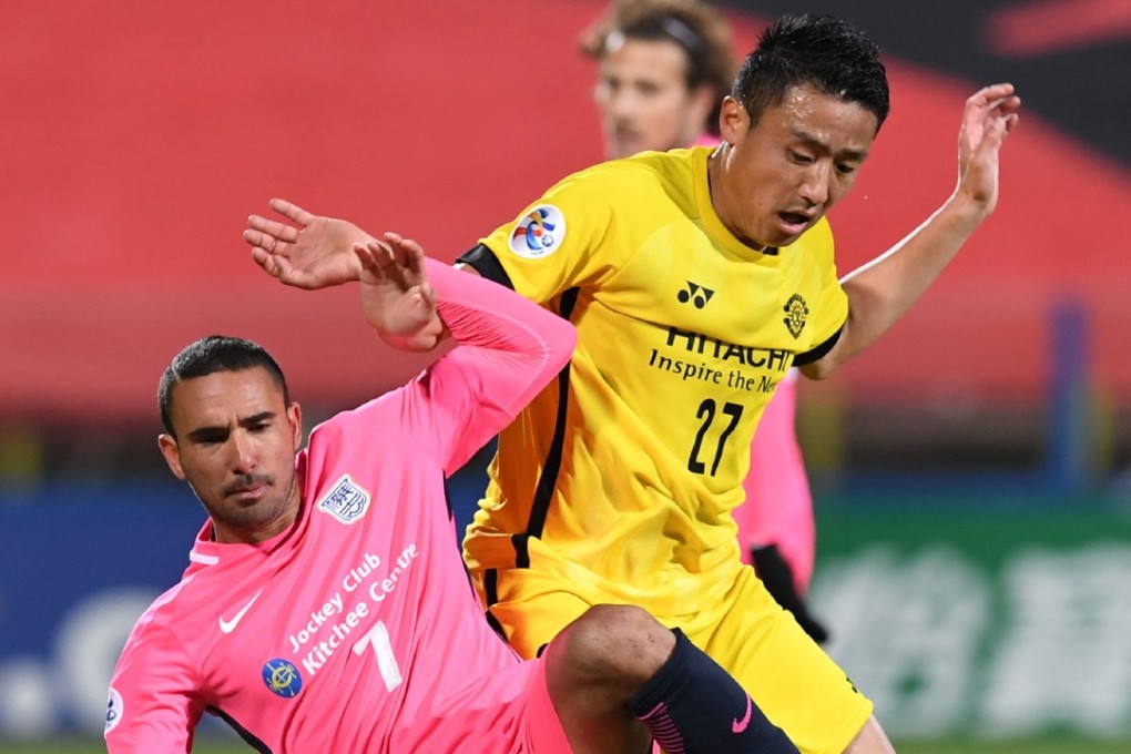 Kitchee's Fernando tangles with Kashiwa Reysol's Tomoki Imai in the Champions League. Photos: AFP