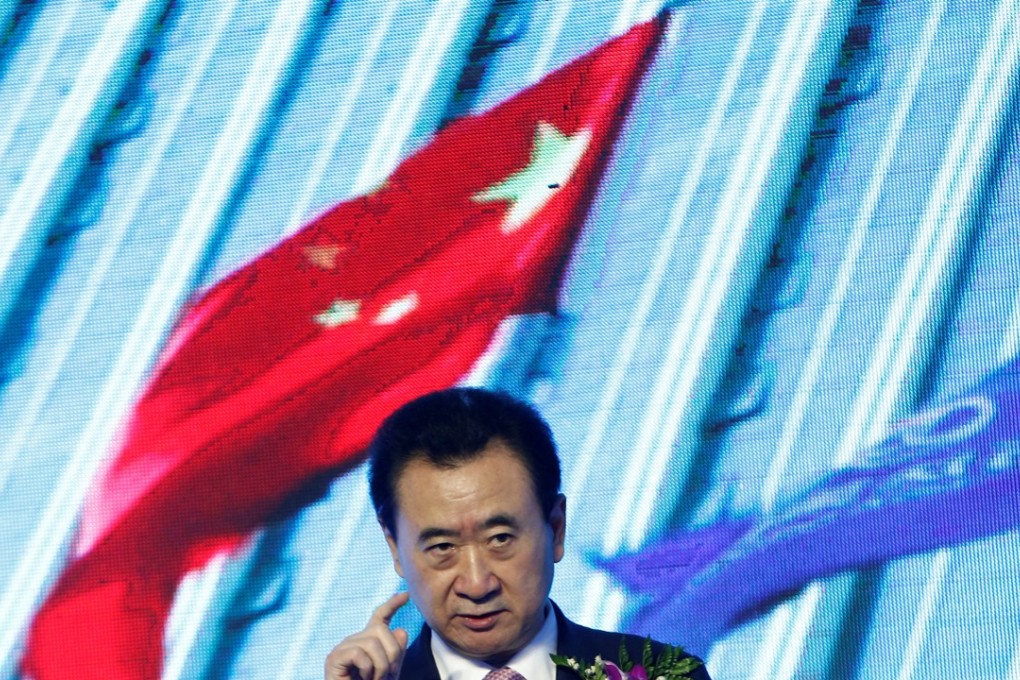 Wanda Group Chairman Wang Jianlin speaks before a deal between his company and the Abbott World Marathon Majors in Beijing. Photo: Reuters