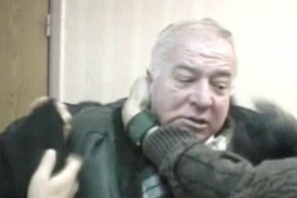 A still image taken from an undated video shows Sergei Skripal being detained by secret service officers in an unknown location. Photo: RTR/via Reuters