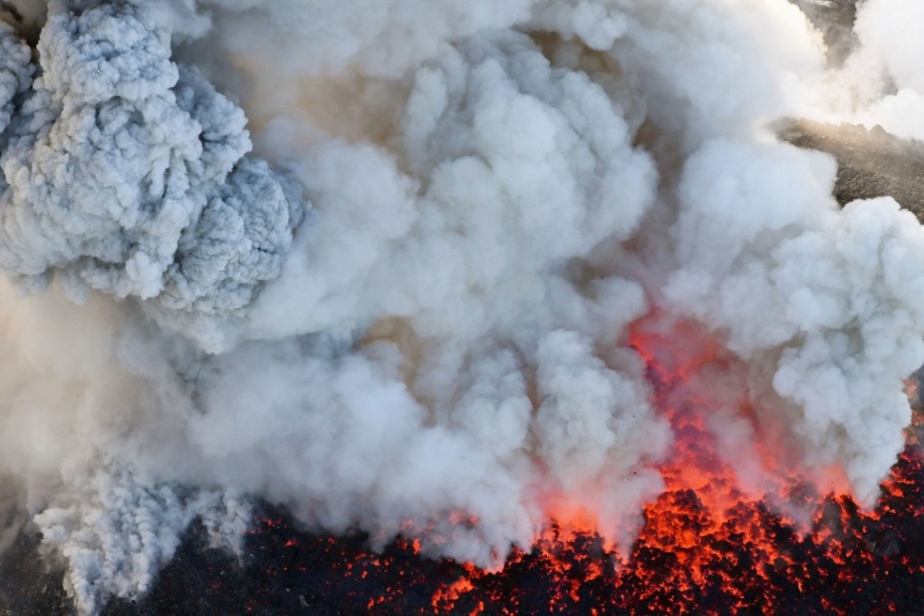 An aerial view shows Mount Shinmoe erupting. Photo: Kyodo