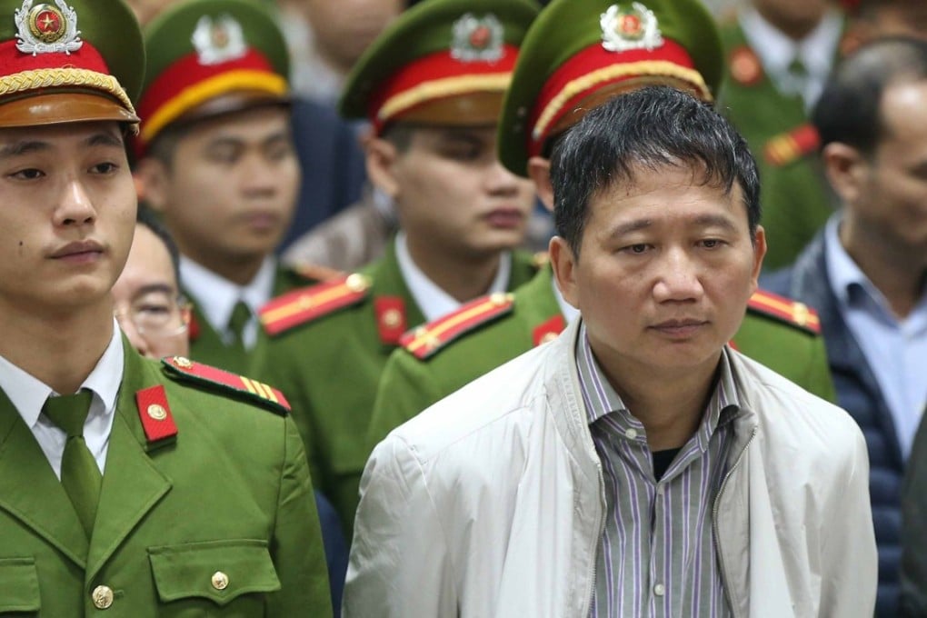 Vietnamese former state oil executive Trinh Xuan Thanh listens to the verdict in his trial at Hanoi's People's Court. German prosecutors on March 7 laid charges against a suspected Vietnamese agent over last year's kidnapping of Trinh Xuan Thanh in Berlin. Photo: AFP