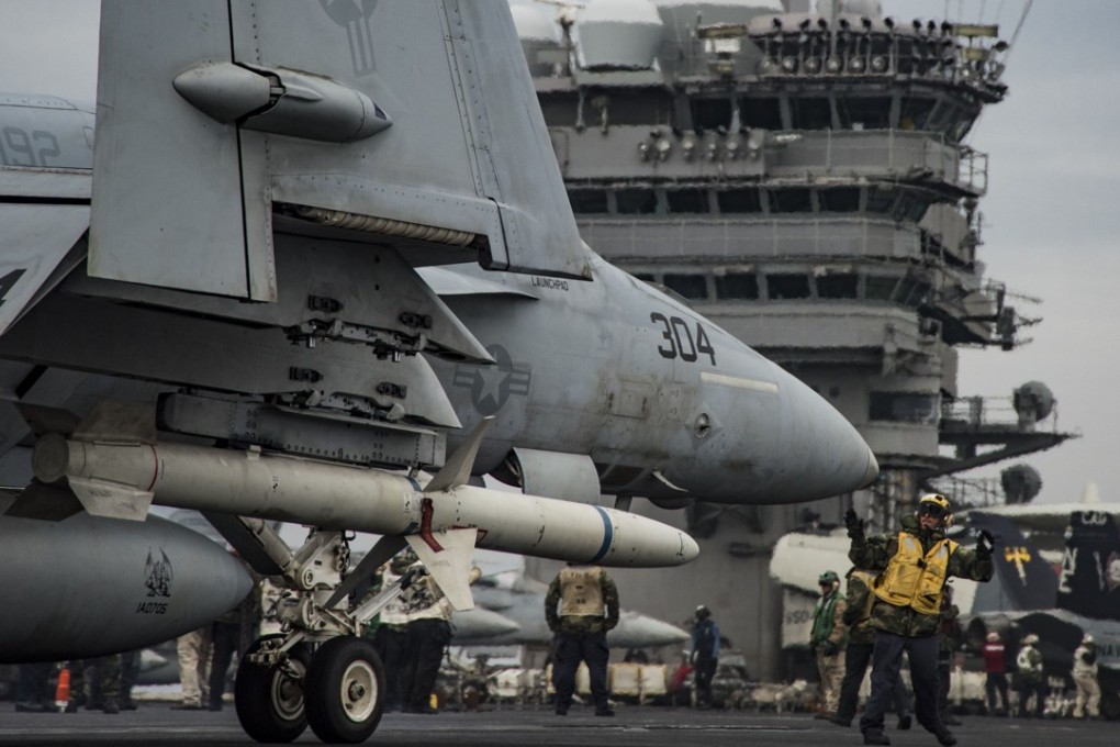 An F/A-18E Super Hornet prepares to launch from the USS Carl Vinson in this file image taken last year. China’s state media said Beijing was monitoring the arrival of the aircraft carrier in the South China Sea. Photo: AFP
