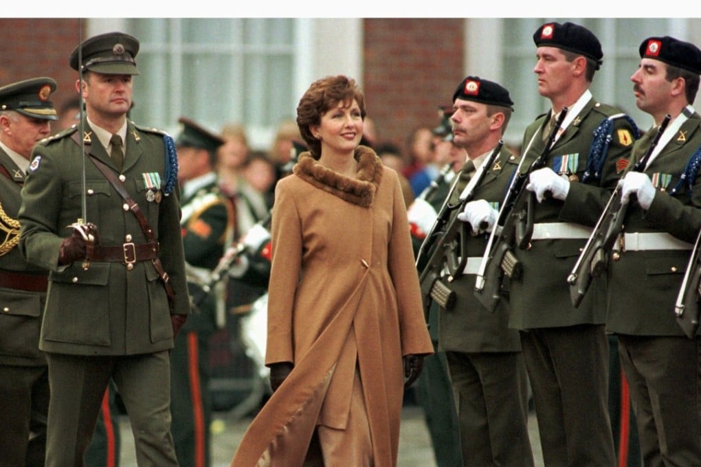 Irish President Mary McAleese inspects a guard of honour in the upper yard of Dublin castle after her inauguration ceremony in 1997. Photo: Reuters