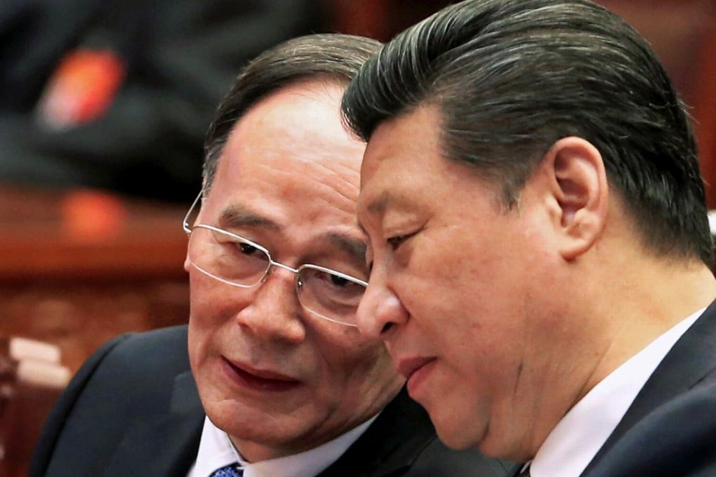 Former anti-graft tsar Wang Qishan (left) and President Xi Jinping in Beijing in March 2015. Photo: Reuters