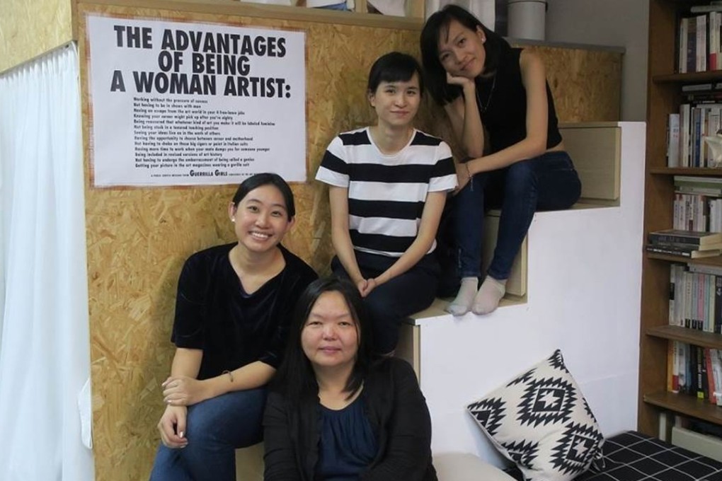 Asia Art Archive’s Phoebe Wong (front) with artists (from left) Ho Sin-tung, Ko Sin-tung, and Elva Lai at Ho's studio. Photo: Peter Bird