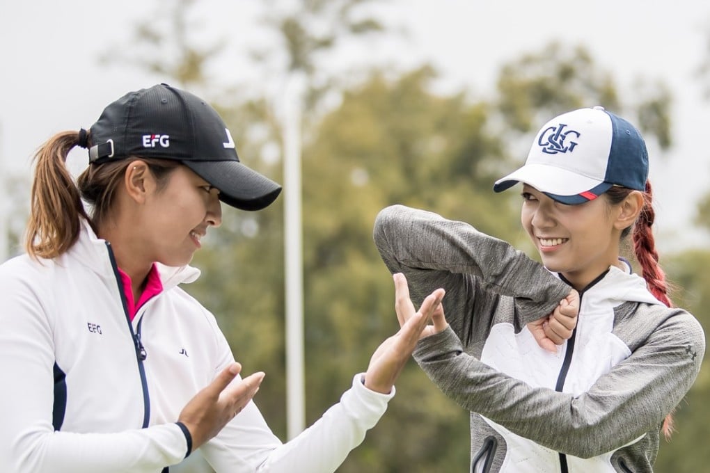 Pop star Stephanie Ho (right) and LPGA golfer Tiffany Chan celebrate their friendship of 20 years at Fanling. Photo: Ike Li