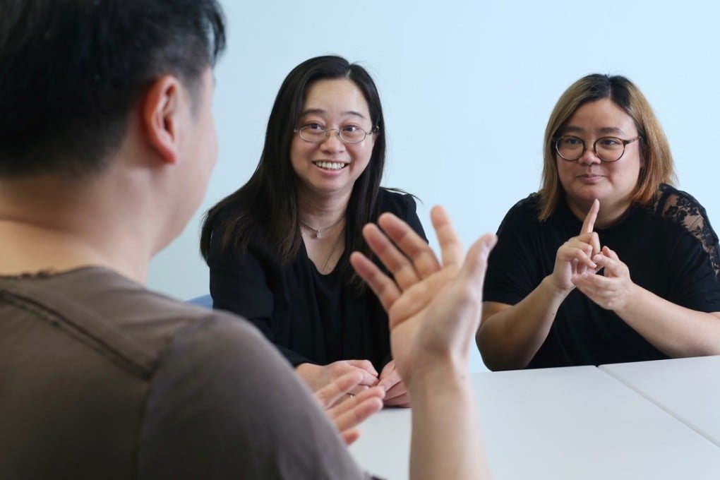 Connie Lo (right) and Felix Sze (left) at the Centre for Sign Linguistics and Deaf Studies. Photo: Edmond So