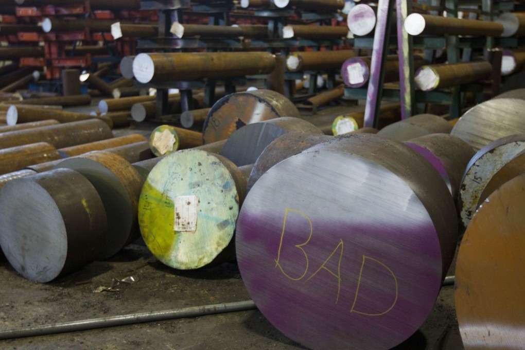 The word bad is written on the end of a machine grade bar of steel at the Pacific Machinery & Tool Steel Company this week in Portland, Oregon. US President Donald Trump announced he intends to impose tariffs on imported steel and aluminium, sparking fears that such actions could provoke a trade war. Photo: AP