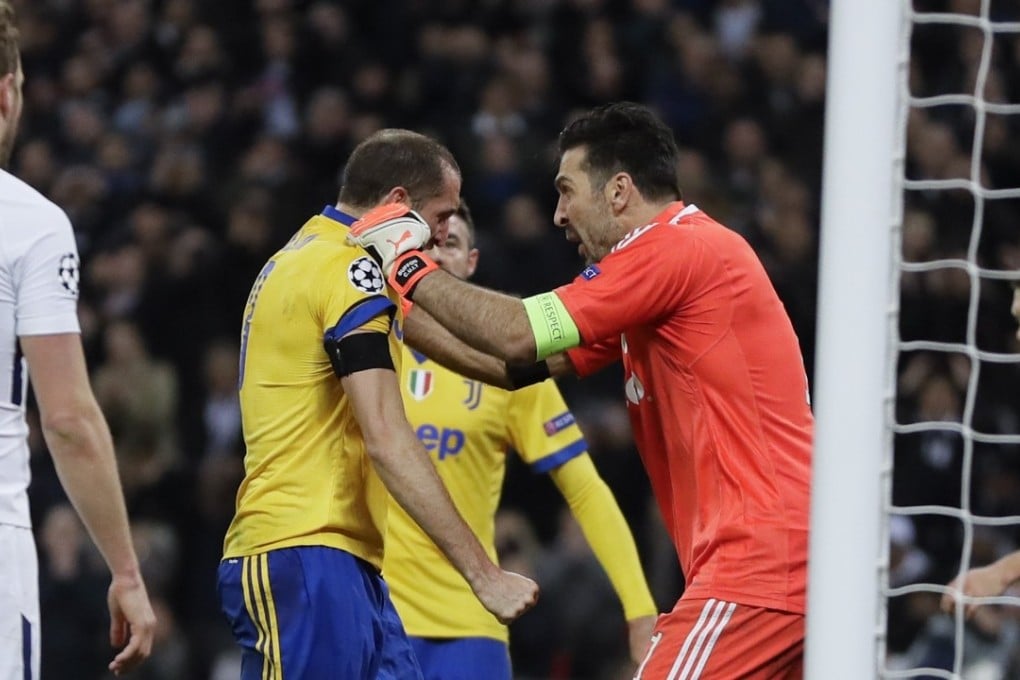Juventus goalkeeper Gianluigi Buffon congratulates his teammate Giorgio Chiellini for a superb clearance during the Champions League match against Tottenham Hotspur. Photo: AP