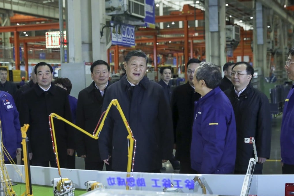 Chinese President Xi Jinping hears how the Xuzhou Construction Machinery Group is participating in the belt and road construction while visiting the company plant in Xuzhou, Jiangsu province, last December. Photo: Xinhua