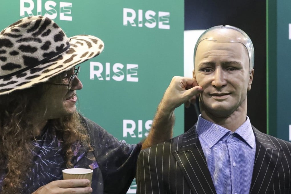 Ben Goertzel, chief scientist at Hong Kong Science Park-based Hanson Robotics, presents Han the robot at a conference in July 2017. The Science Park will administer HK$40 billion of the funding allocated to the promotion of innovation and technology in the budget. Photo: Nora Tam