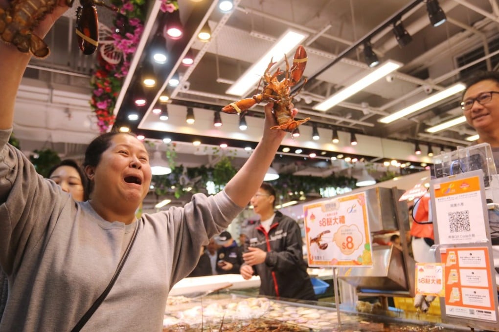 Meggie Ng Chun-chun, the first lobster buyer with the new Octopus payment system. Photo: Xiaomei Chen
