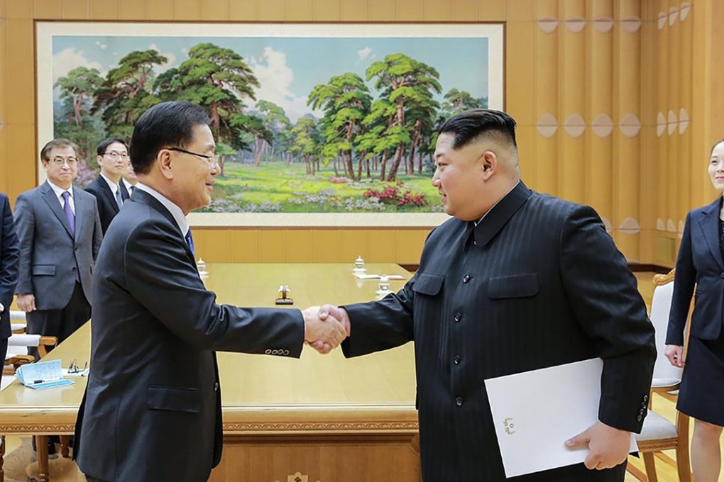 North Korean leader Kim Jong-un (right) shaking hands with South Korea’s chief negotiator Chung Eui-yong, who travelled to Pyongyang for meetings with the North’s leadership. Photo: AFP