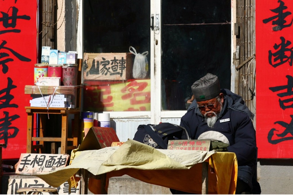 Fortune-telling is a widespread in China, with predictions usually based on people’s names, time of birth, Chinese zodiac signs, facial features and palms. Photo: afp