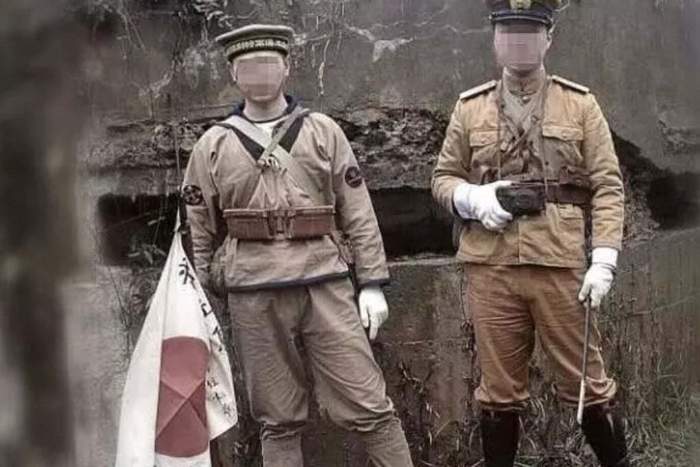Two men pose in Japanese imperial military uniforms at a memorial site in Nanjing earlier this year. Such actions would be punishable under suggested changes to the criminal code. Photo: Huanqiu.com