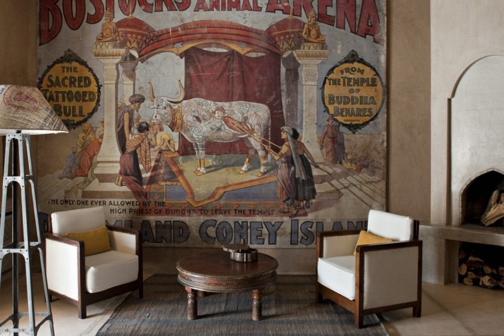 Each suite at the Dar Ahlam hotel is decorated differently, with antique furnishings that offset the patinated terracotta interiors.