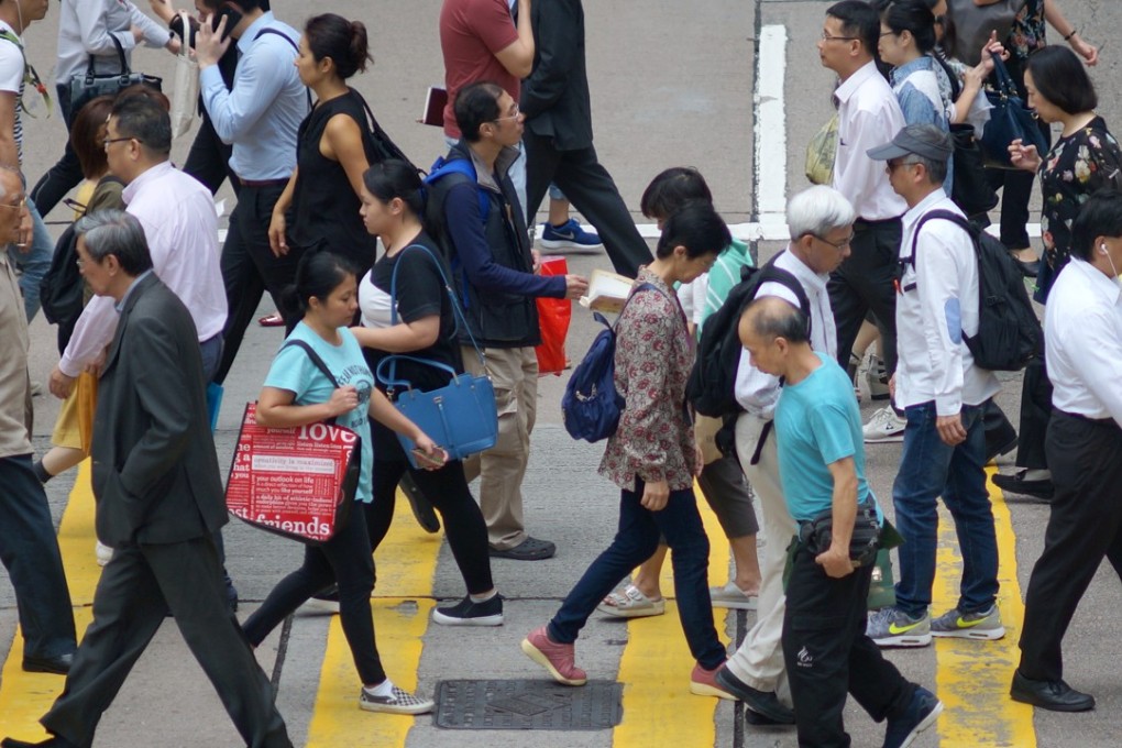 Employers and labour unions in Hong Kong have yet to come to a consensus on standard working hours. Photo: Fung Chang
