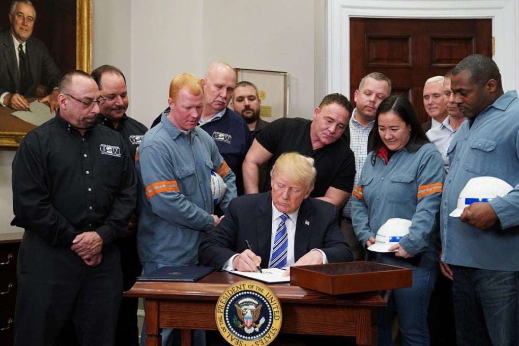 US President Trump signs Section 232 Proclamations on Steel and Aluminium Imports in the Oval Office of the White House on March 8. Next week’s first midterm election contests are in Pennsylvania, where hundreds of thousands of steel workers have seen catastrophic decline over the past four decades. Trump travels there this weekend to fend off a Democratic challenge. Photo: AFP