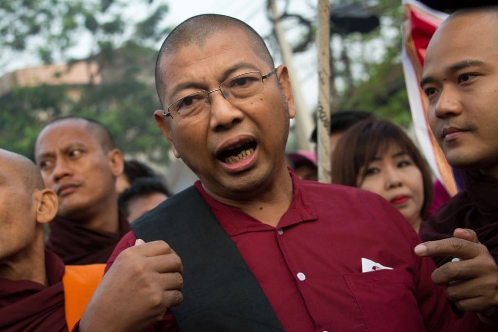 Ultra-nationalist monk Pamaukkha talks to the media after being released from Insein prison in Yangon on March 9, 2018. Photo: AFP