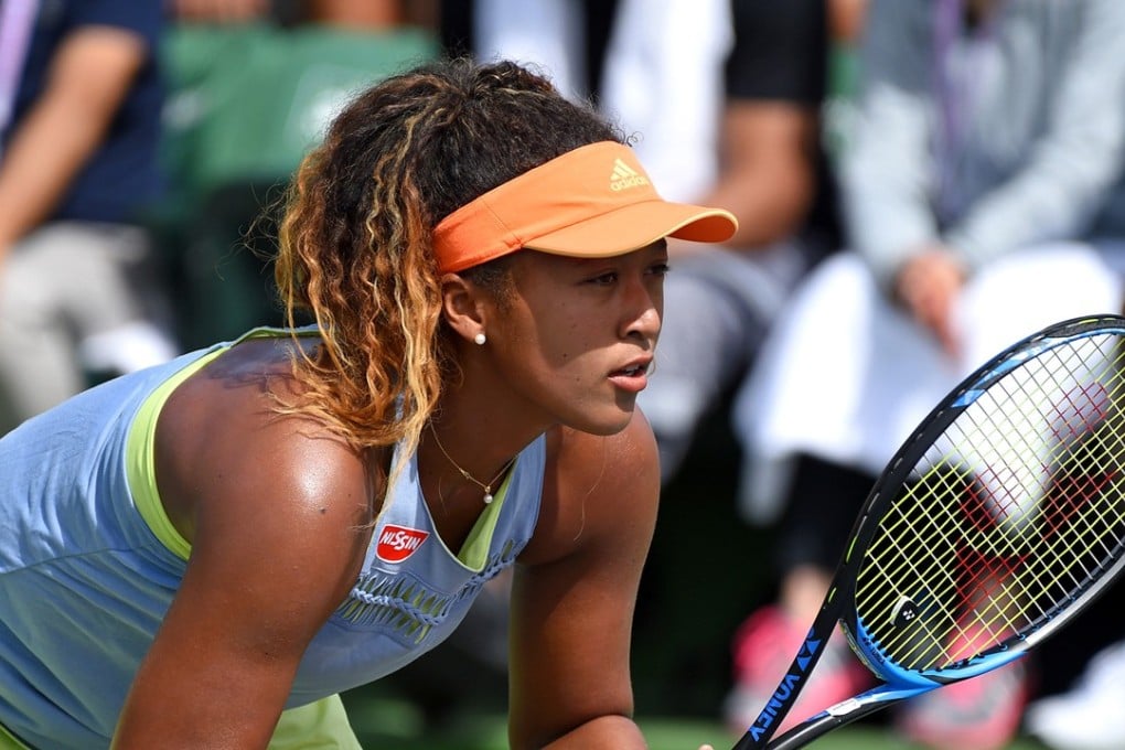Japan’s Naomi Osaka awaits service during her first round match against Agnieszka Radwanksa in the BNP Open. Photo: USA Today