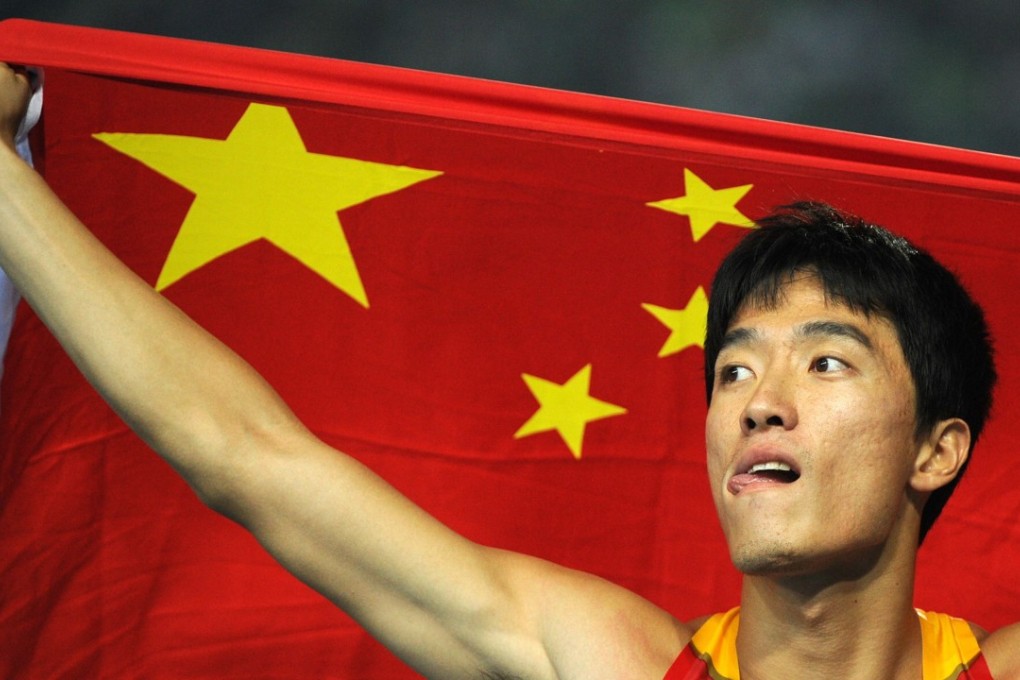 (China's Liu Xiang reacts after competing in the men's 110 metres hurdles final at the 2011 World Championships. Photo: AFP